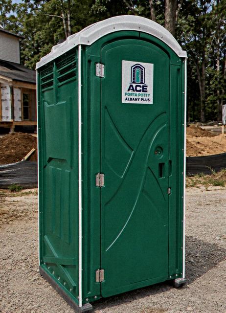 Porta potty rental placed on a residential construction site