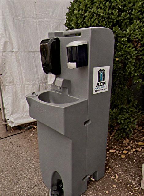 Portable handwash station rental with soap and paper towel dispensers